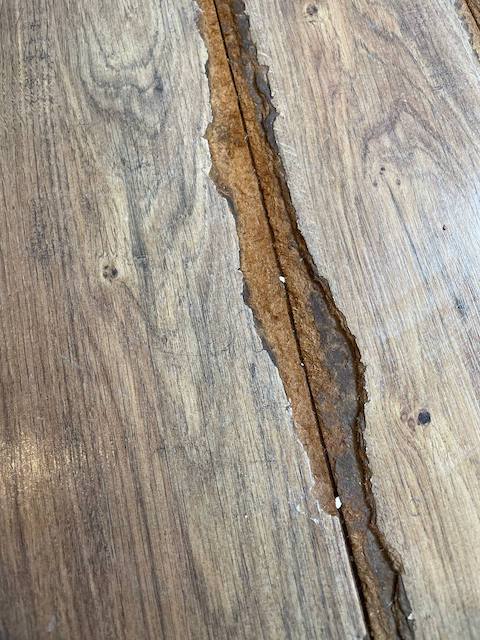 Cómo reparar tu tarima flotante rayada 4 Lama de la tarima flotante rayada