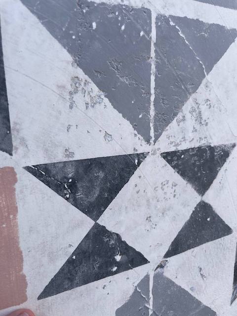 Efecto azulejo hidraúlico antiguo en pared de cocina exterior