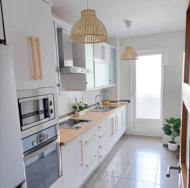 Ideas para reformar la cocina sin obras, cocina de alto brillo después pintada en blanco