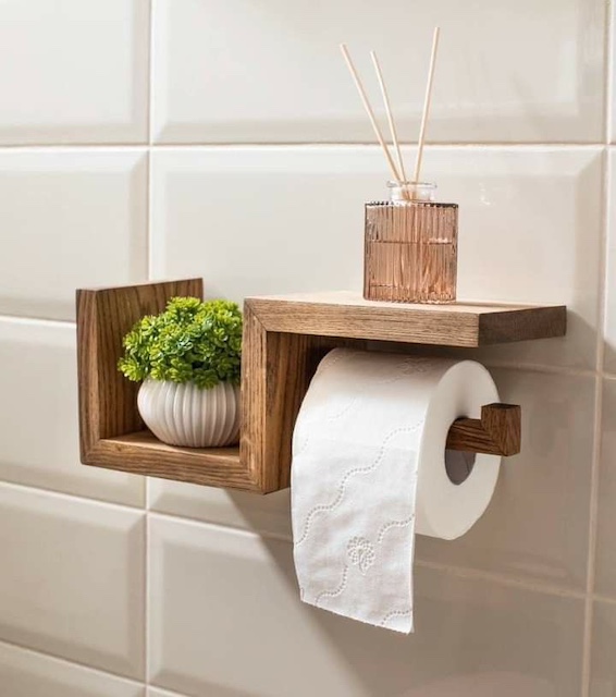 Ideas para pintar baños con el arte del Feng Shui: decoración elemento madera porta rollos
